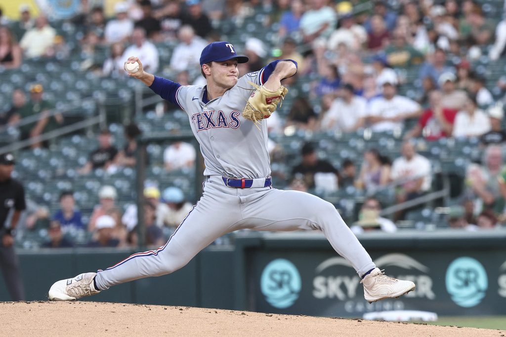 Texas Rangers pitcher Jack Leiter throws to the Athletics during the first inning of a baseball game Friday, Aug. 29, 2025, in West Sacramento, Calif. (AP Photo/Sara Nevis)