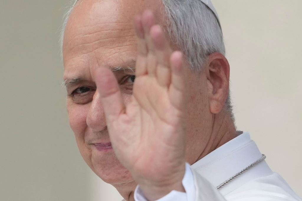 Pope Leo XIV waves as he arrives for his weekly general audience in St. Peter's Square at The Vatican, Wednesday, June 3, 2026. (AP Photo/Andrew Medichini)