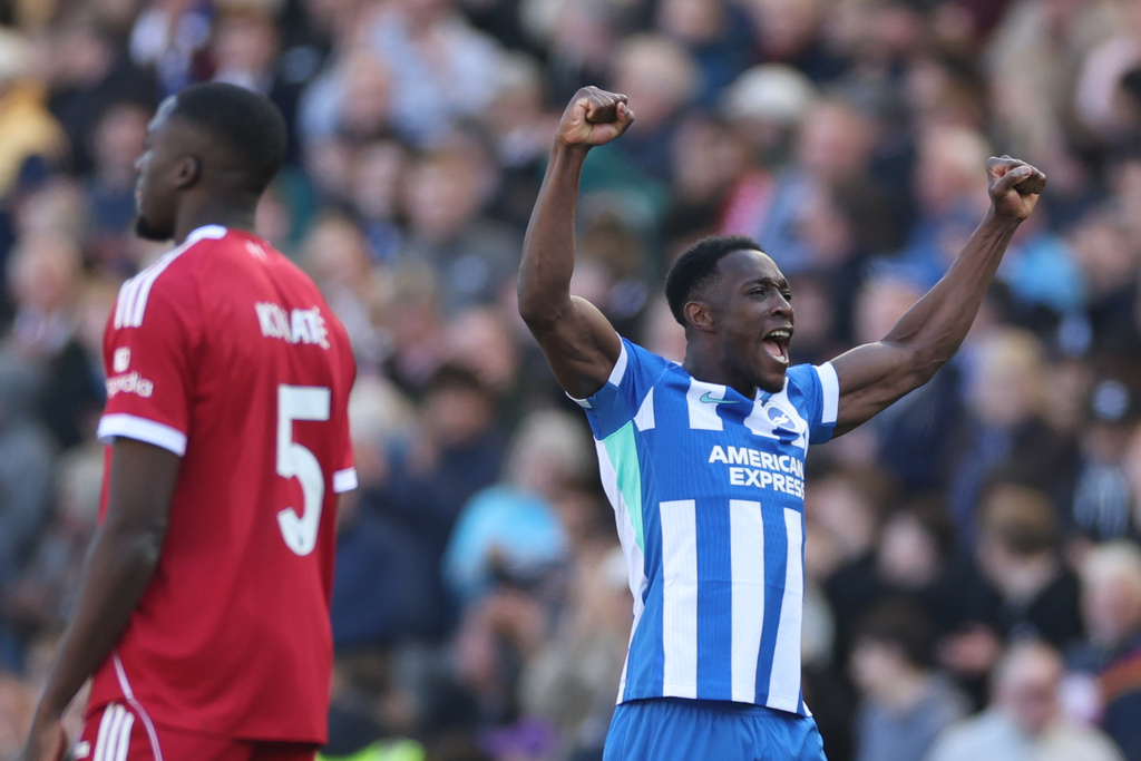 Brighton's Danny Welbeck celebrates after scoring during the English Premier League soccer match between Brighton and Liverpool in Brighton, Saturday, March 21, 2026. (AP Photo/Ian Walton)