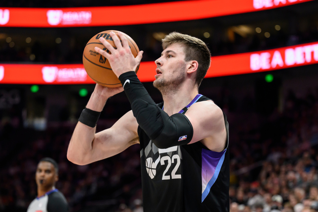 Utah Jazz forward Kyle Filipowski looks to shoot during the first half of an NBA basketball game against the Cleveland Cavaliers, Monday, March 30, 2026, in Salt Lake City. (AP Photo/Tyler Tate)