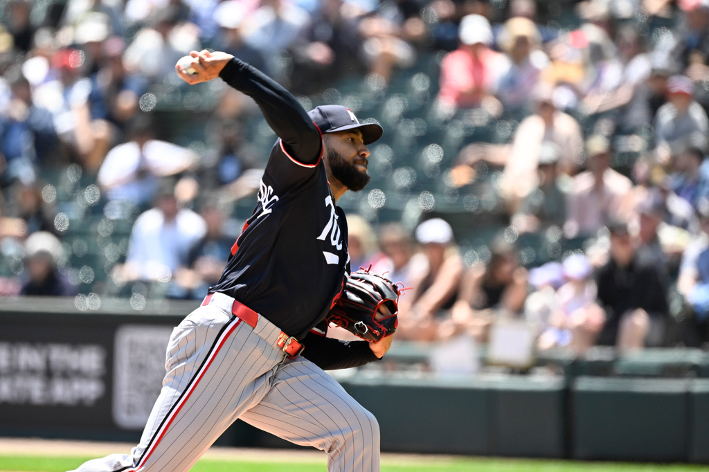 Minnesota Twins pitcher Simeon Woods-Richardson delivers during the first inning of a baseball game against the Chicago White Sox, Thursday, May 28, 2026, in Chicago. (AP Photo/Matt Marton)