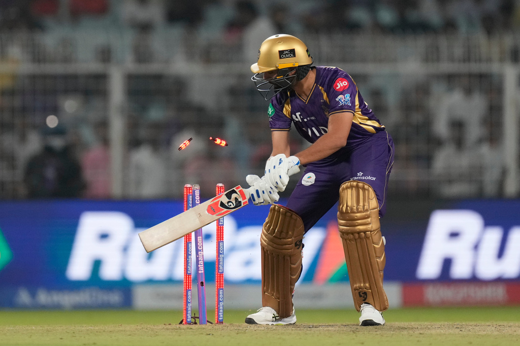 Kolkata Knight Riders' Varun Chakaravarthy bowled out by Sunrisers Hyderabad's Jaydev Unadkat during the Indian Premier League cricket match between Kolkata Knight Riders and Sunrisers Hyderabad in Kolkata, India, Thursday, April. 2, 2026. (AP Photo/ Bikas Das)