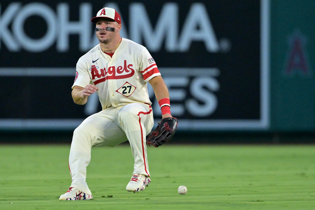 Los Angeles Angels center fielder Mike Trout looks to field a single by Cleveland Guardians' Petey Halpin during the fourth inning of a baseball game Monday, Aug. 24, 2026, in Anaheim, Calif. (AP Photo/Jayne Kamin-Oncea)