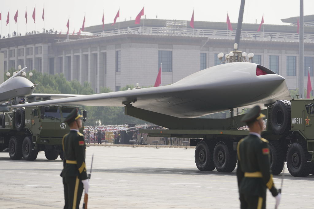 A GJ-11, stealth unmanned combat aerial vehicle takes part in a military parade to commemorate the 80th anniversary of Japan's World War II surrender held in front of Tiananmen Gate in Beijing, Wednesday, Sept. 3, 2025. (AP Photo/Andy Wong)