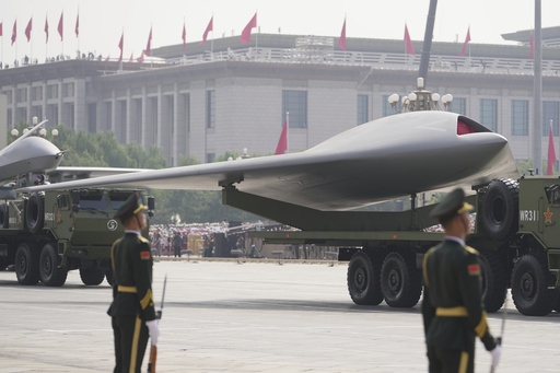 A GJ-11, stealth unmanned combat aerial vehicle takes part in a military parade to commemorate the 80th anniversary of Japan's World War II surrender held in front of Tiananmen Gate in Beijing, Wednesday, Sept. 3, 2025. (AP Photo/Andy Wong) A GJ-11, stealth unmanned combat aerial vehicle takes part in a military parade to commemorate the 80th anniversary of Japan's World War II surrender held in front of Tiananmen Gate in Beijing, Wednesday, Sept. 3, 2025. (AP Photo/Andy Wong)