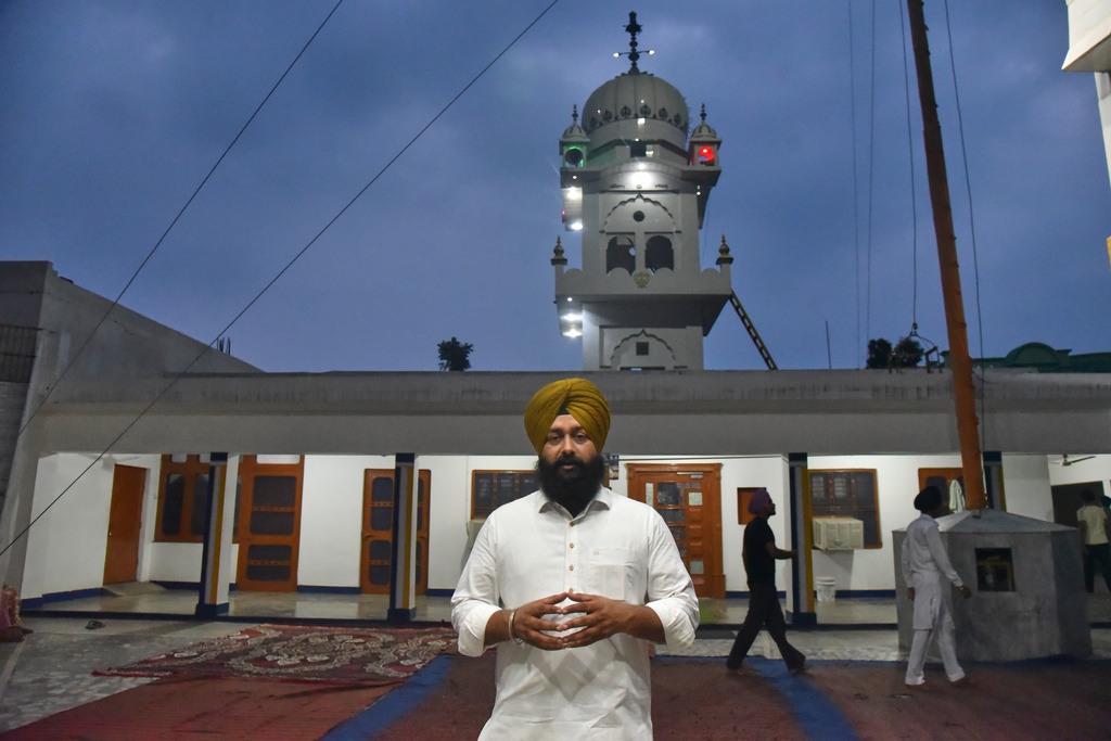 Inderjeet Singh Bains, who coordinated screening of the film “Satluj” talks to The Associated Press at a Sikh temple at Tatley village, in Punjab's Gurdaspur district, India, Wednesday, July 8, 2026. (AP Photo/Prabhjot Gill)