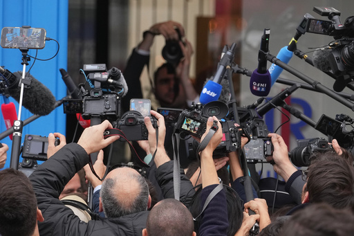 Reporters gather outside the conservative Party Les Republicains headquarters Monday, Oct. 6, 2025 in Paris after France's prime minister Sebastien Lecornu resigned plunging the country into a deep political crisis. (AP Photo/Thibault Camus) Reporters gather outside the conservative Party Les Republicains headquarters Monday, Oct. 6, 2025 in Paris after France's prime minister Sebastien Lecornu resigned plunging the country into a deep political crisis. (AP Photo/Thibault Camus)