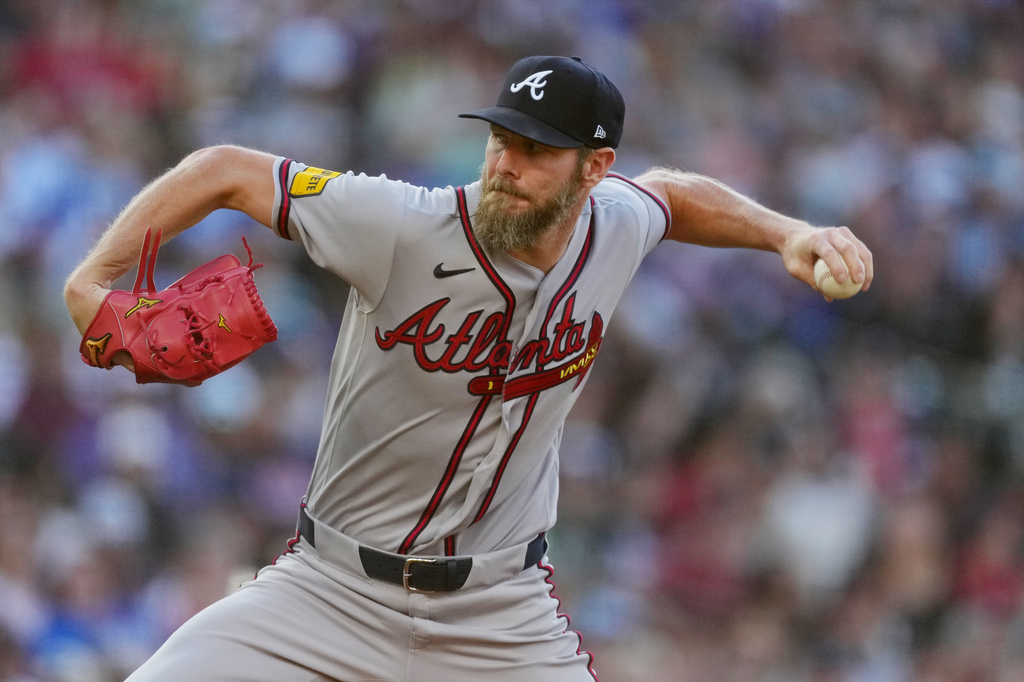 Atlanta Braves starting pitcher Chris Sale works against the Colorado Rockies in the first inning of a baseball game, Saturday, May 2, 2026, in Denver. (AP Photo/David Zalubowski)