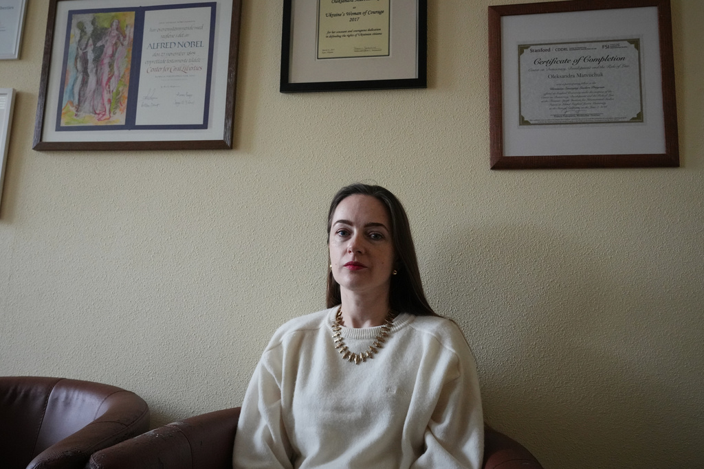 Oleksandra Matviichuk, head of the Center for Civil Liberties, poses in her office in Kyiv, Ukraine, Friday, Feb. 13, 2026. (AP Photo/Sergei Grits)