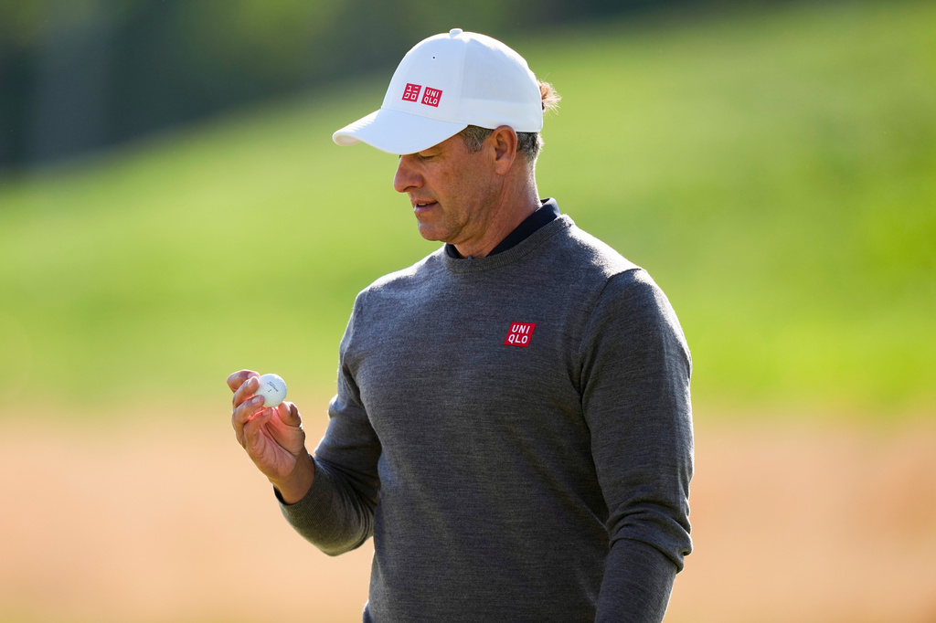 Adam Scott, of Australia, looks at his ball on the 10th green during the second round of the PGA Championship golf tournament at Aronimink Golf Club, Friday, May 15, 2026, in Newtown Square, PA. (AP Photo/Matt Slocum)