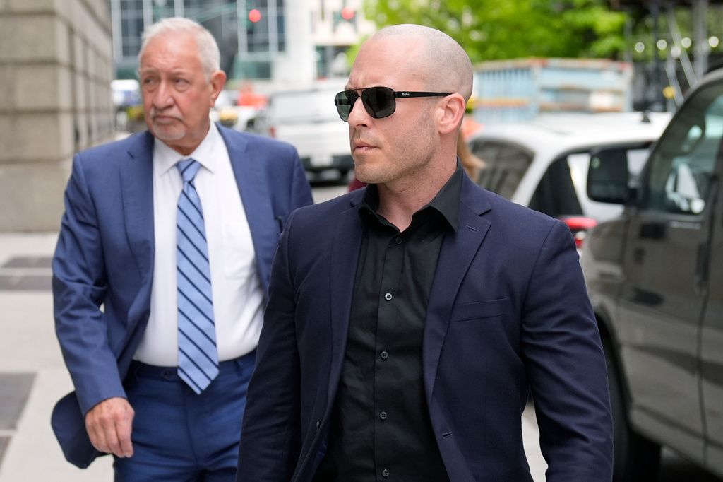 Gannon Ken Van Dyke, a soldier who is charged with using his access to classified information about the operation to capture Venezuelan President Nicolas Maduro in January to win money on Polymarket, walks near a federal court building in New York on Tuesday, April 28, 2026. (AP Photo/Seth Wenig)