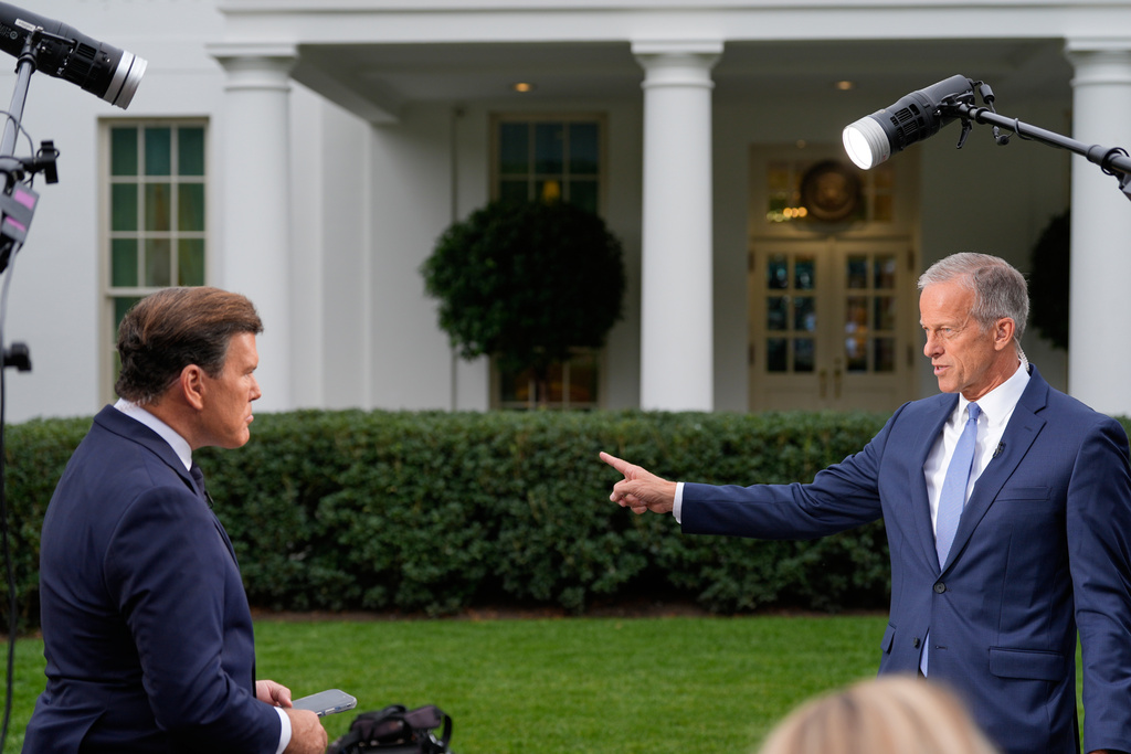 Senate Majority Leader John Thune, R-S.D., is interviewed by FOX News Channel's Bret Baier outside the West Wing of the White House, Monday, Sept. 29, 2025, in Washington. (AP Photo/Alex Brandon)
