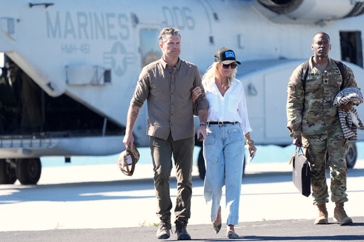 Defense Secretary Pete Hegseth, from left, and his wife Jennifer Rauchet walk during activities to mark the upcoming Marine Corps' 250th anniversary Saturday, Oct 18, 2025, on Marine Corps Base Camp Pendleton in Camp Pendleton, Calif. (AP Photo/Gregory Bull) Defense Secretary Pete Hegseth, from left, and his wife Jennifer Rauchet walk during activities to mark the upcoming Marine Corps' 250th anniversary Saturday, Oct 18, 2025, on Marine Corps Base Camp Pendleton in Camp Pendleton, Calif. (AP Photo/Gregory Bull)