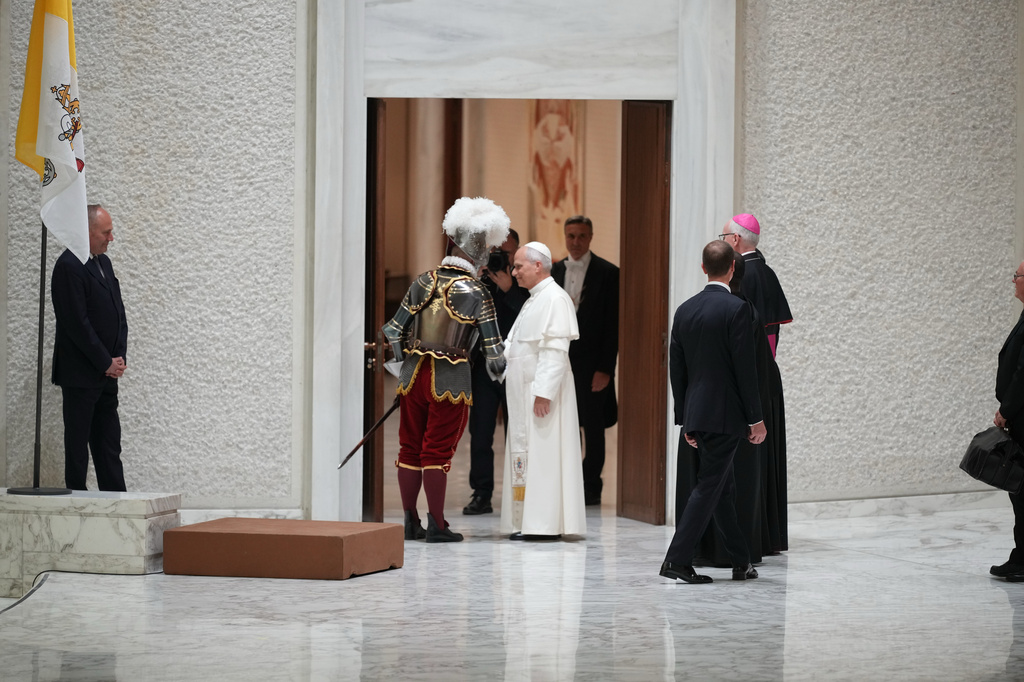 Pope Leo XIV attends the swearing in ceremony for 28 new Pontifical Swiss Guards in the Paul VI Hall at the Vatican, Wednesday, May 6, 2026. (AP Photo/Andrew Medichini)