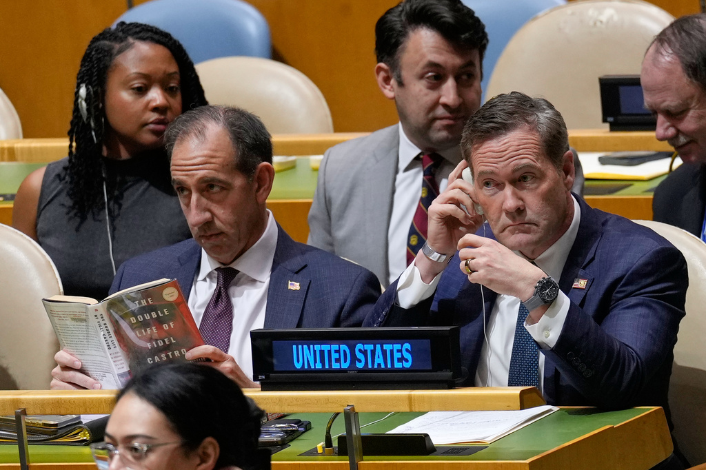The United States delegation, including U.S ambassador to the United Nations Mike Waltz, foreground right, listens to speakers at U.N. headquarters, Wednesday, Oct. 28, 2026. (AP Photo/Seth Wenig)