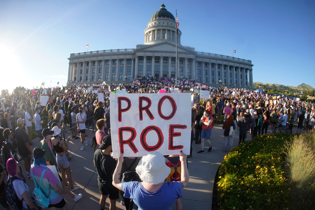 FILE - People attend an abortion-rights rally at the Utah State Capitol in Salt Lake City after the U.S. Supreme Court overturned Roe v. Wade, June 24, 2022. (AP Photo/Rick Bowmer, File)