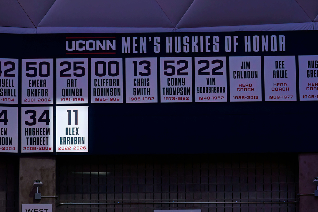 UConn forward Alex Karaban's name and number is highlighted during a pregame ceremony adding Karaban to the Huskies of Honor before an NCAA college basketball game between UConn and Seton Hall, Saturday, Feb. 28, 2026, in Storrs, Conn. (AP Photo/Jessica Hill)