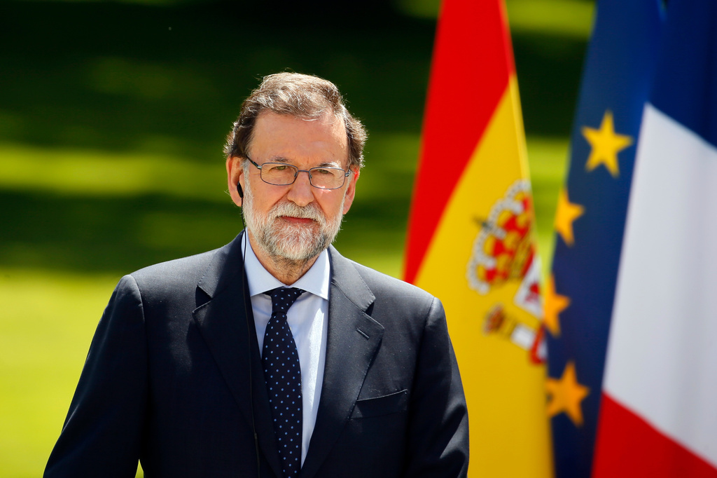FILE - Spain's Prime Minister Mariano Rajoy attends a press conference at the Elysee Palace in Paris, France, Friday, June 16, 2017. (AP Photo/Francois Mori, File)
