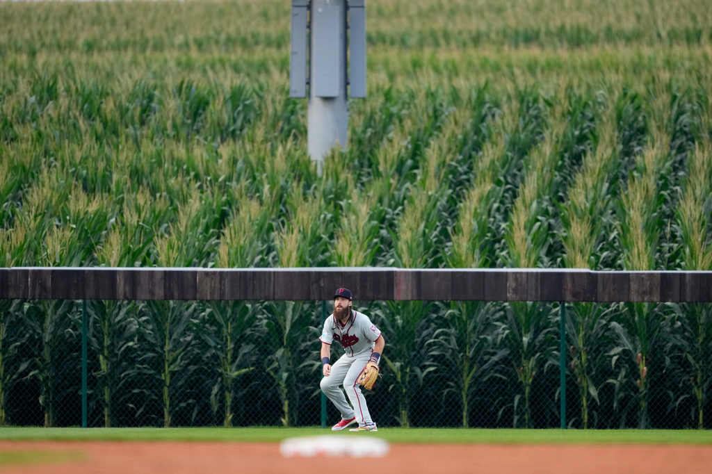 Philadelphia Phillies left fielder Brandon Marsh gets set for a play during the second inning of a baseball game against the Minnesota Twins at the Field of Dreams movie site, Thursday, Aug. 13, 2026, in Dyersville, Iowa. (AP Photo/Charlie Neibergall)