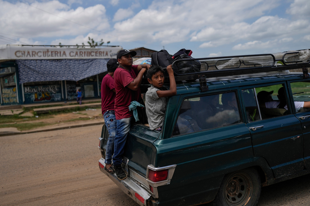 People travel in Maracaibo, Venezuela, June 17, 2025. (AP Photo/Matias Delacroix)
