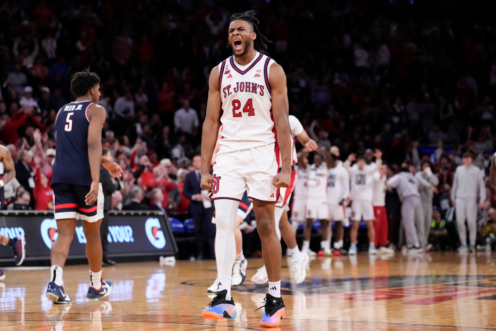 St. John's forward Zuby Ejiofor (24) reacts during the second half of an NCAA college basketball game against UConn in the championship of the Big East tournament, Saturday, March 14, 2026, in New York. (AP Photo/Yuki Iwamura)