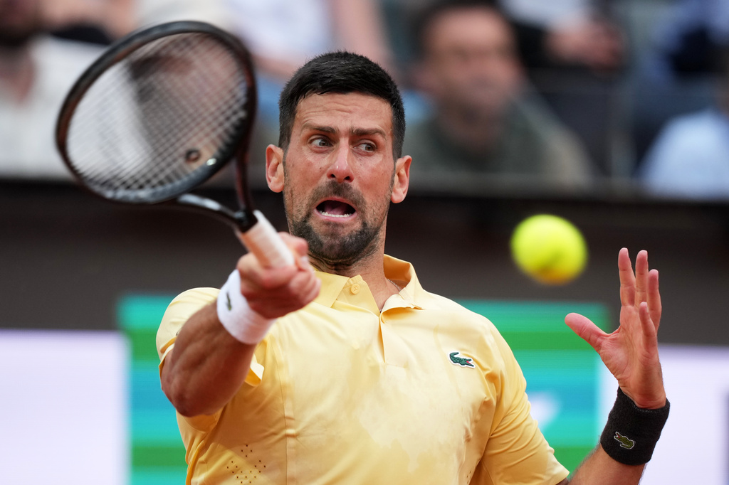 Serbia's Novak Djokovic returns the ball to Croatia's Dino Prizmic during their match at the Italian Open tennis tournament, in Rome, Friday, May 8, 2026. (AP Photo/Andrew Medichini)