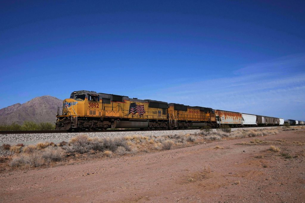 FILE - A Union Pacific freight train travels along the tracks, April 17, 2025, in Eloy, Ariz. (AP Photo/Ross D. Franklin, File)