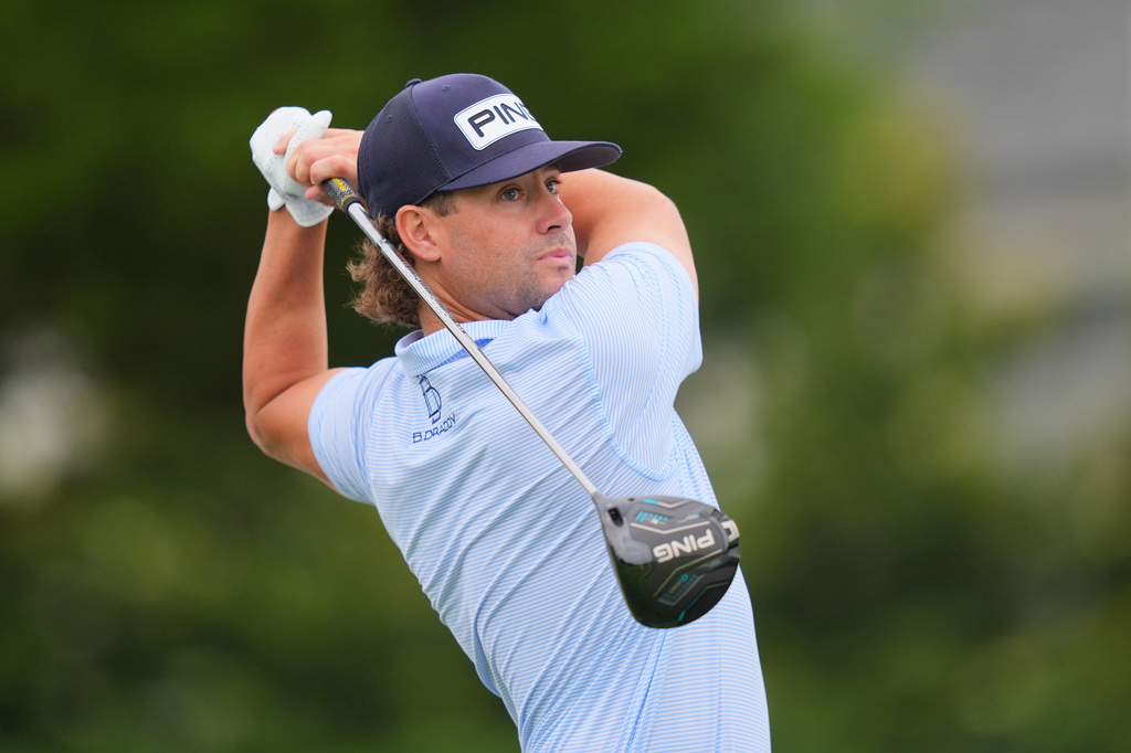 Taylor Moore watches his tee shot not the eighth hole during the first round of the Byron Nelson golf tournament in McKinney, Texas, Thursday, May 21, 2026. (AP Photo/LM Otero)