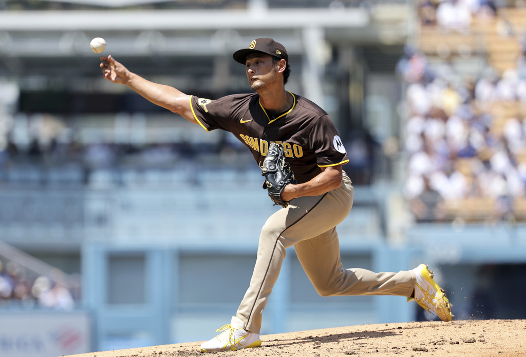 San Diego Padres pitcher Yu Darvish delivers against the Los Angeles Dodgers during the second inning of a baseball game, Sunday, Aug. 17, 2025, in Los Angeles. (AP Photo/Kevork Djansezian)