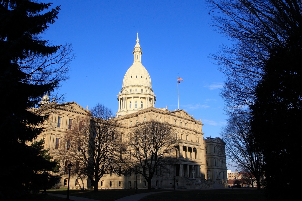 FILE - The state Capitol building is seen on Dec. 12, 2012, in Lansing, Mich. (AP Photo/Carlos Osorio, File)