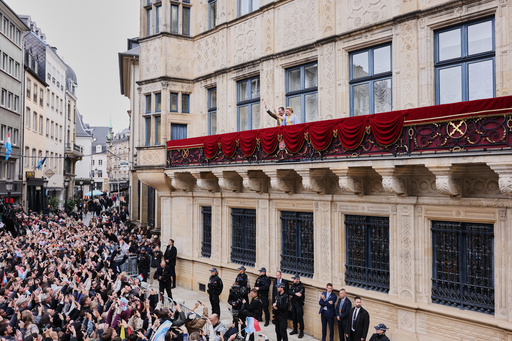 Luxembourg's Grand Duke Guillaume and Luxembourg's Grand Duchess Stephanie wave from the balcony of the Grand Ducal Palace in Luxembourg, Friday, Oct. 3, 2025. (AP Photo/Omar Havana) Luxembourg's Grand Duke Guillaume and Luxembourg's Grand Duchess Stephanie wave from the balcony of the Grand Ducal Palace in Luxembourg, Friday, Oct. 3, 2025. (AP Photo/Omar Havana)