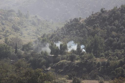 Smoke rises from a hillside following overnight clashes between Afghan and Pakistani forces along the border in the Zazai Maidan district of Khost province, Afghanistan, Sunday, Oct. 12, 2025. (AP Photo/Saifullah Zahir) Smoke rises from a hillside following overnight clashes between Afghan and Pakistani forces along the border in the Zazai Maidan district of Khost province, Afghanistan, Sunday, Oct. 12, 2025. (AP Photo/Saifullah Zahir)