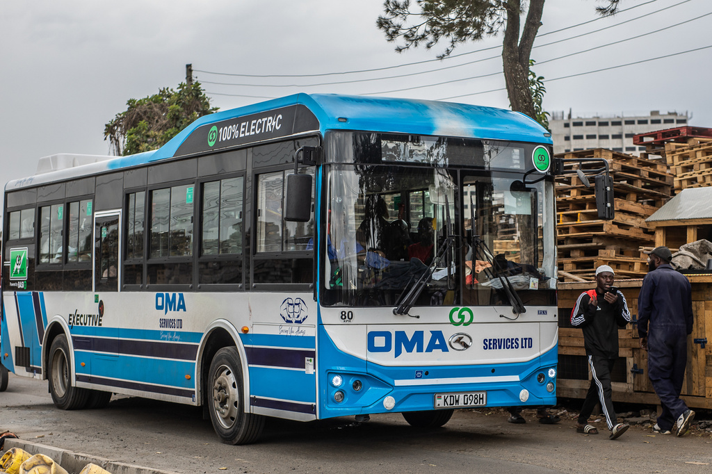 A battery electric bus drives through the streets of Nairobi, Kenya, Tuesday, Feb. 17, 2026. (AP Photo/Samson Otieno)