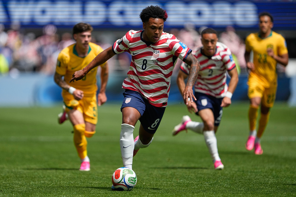 FILE - United States' Weston McKennie (8) moves the ball during the World Cup Group D soccer match between the United States and Australia in Seattle, Friday, June 19, 2026. (AP Photo/Lindsey Wasson, File)
