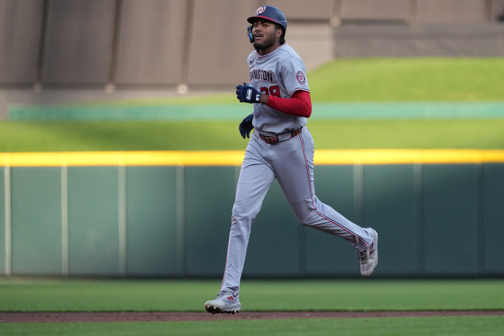 Washington Nationals' James Wood rounds the bases after hitting a solo home run during the third inning of a baseball game against the Cincinnati Reds, Tuesday, May 12, 2026, in Cincinnati. (AP Photo/Kareem Elgazzar)