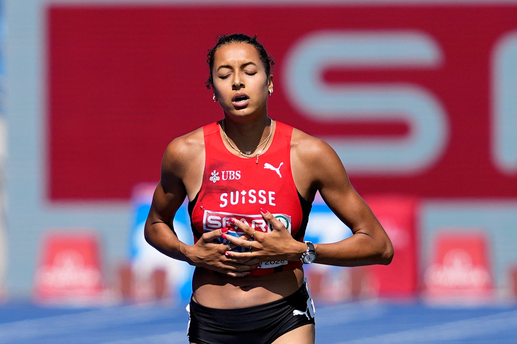 Switzerland's Audrey Werro approaches the finish line in last place after falling to the ground during a women's 800 meters semifinal at the European Athletics Championships in Birmingham, England, Thursday, Aug. 13, 2026. (AP Photo/Matthias Schrader)
