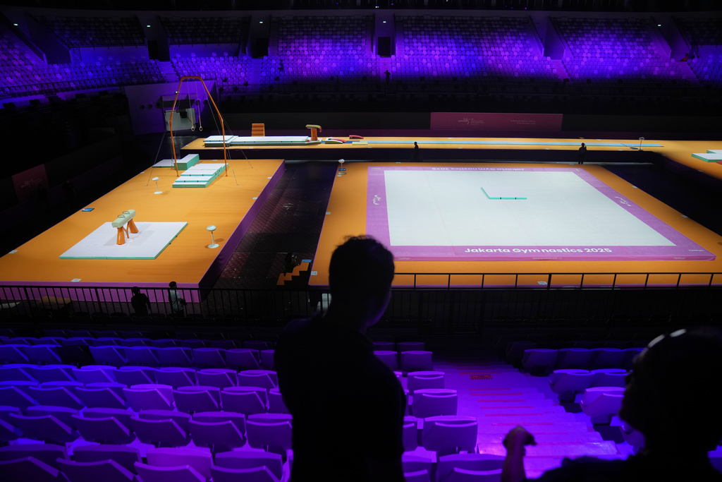Workers are seen at the venue prepared for the Artistic Gymnastics World Championships at Indonesia Arena in Jakarta, Indonesia, Friday, Oct. 10, 2025. (AP Photo/Dita Alangkara)