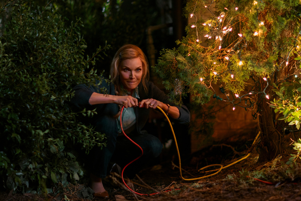 This image released by Amazon Prime shows Michelle Pfeiffer in a scene from "Oh. What. Fun." (Alisha Wetherill/Amazon Prime via AP)