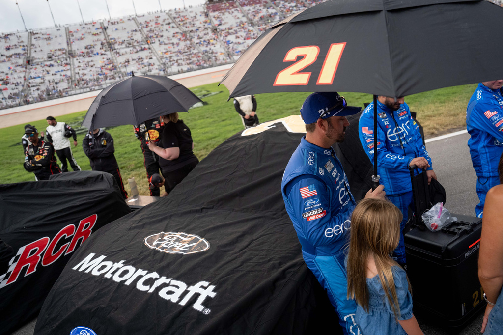 Josh Berry waits out the rain before a NASCAR Cup Series auto race, Sunday, May 31, 2026, in Lebanon, Tenn. (AP Photo/Camden Hall)