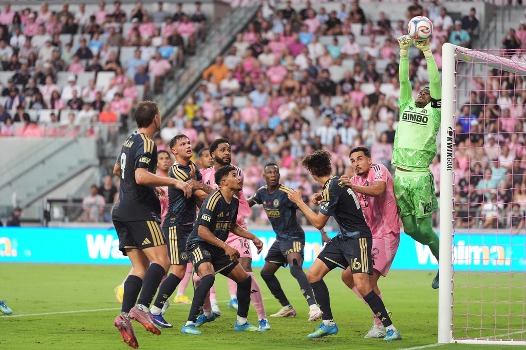 Philadelphia Union goalkeeper Andre Blake (18) deflects a corner kick from Inter Miami forward Lionel Messi during the first half of an MLS soccer match, Sunday, May 24, 2026, in Miami. (AP Photo/Rebecca Blackwell)