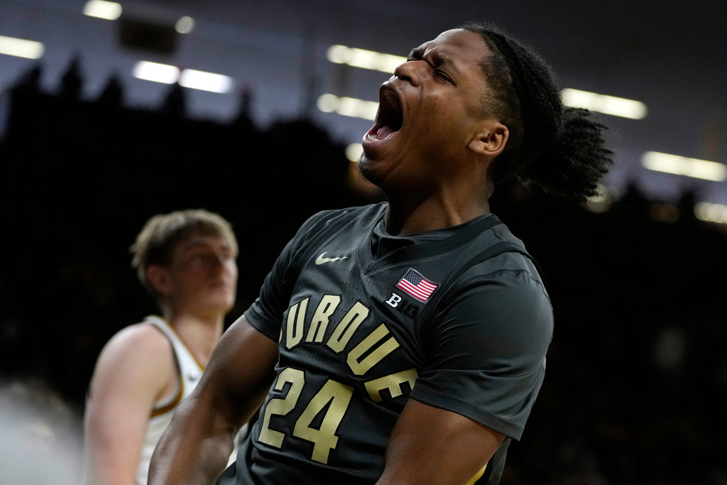 Purdue guard Gicarri Harris celebrates after making a basket during the first half of an NCAA college basketball game against Iowa, Saturday, Feb. 14, 2026, in Iowa City, Iowa. (AP Photo/Charlie Neibergall)