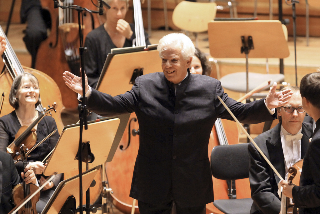 FILE - The former chief conductor of the NDR Symphony Orchestra, Christoph von Dohnanyi, center, stands onstage in the Laeiszhalle, in Hamburg, Germany, Sept. 8, 2009. (Bodo Marks/dpa via AP, File)