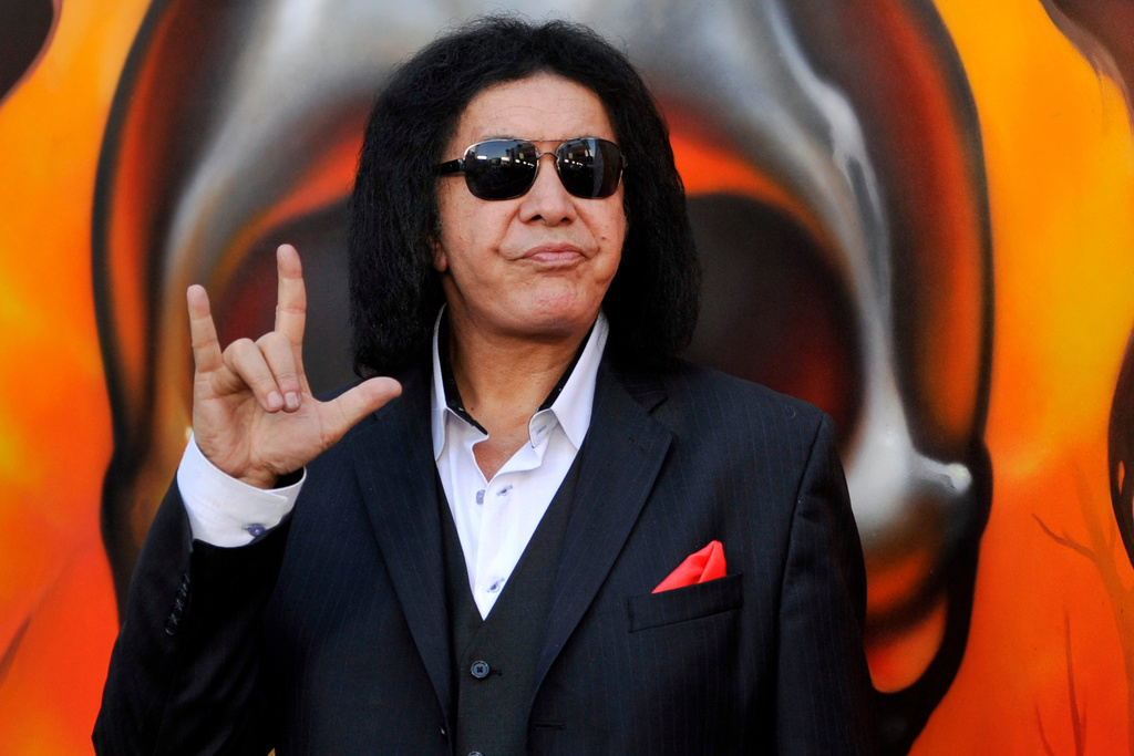 FILE - Gene Simmons of Kiss poses before the 2013 Revolver Golden Gods Award Show at Club Nokia on May 2, 2013 in Los Angeles. (Photo by Chris Pizzello/Invision/AP, file)