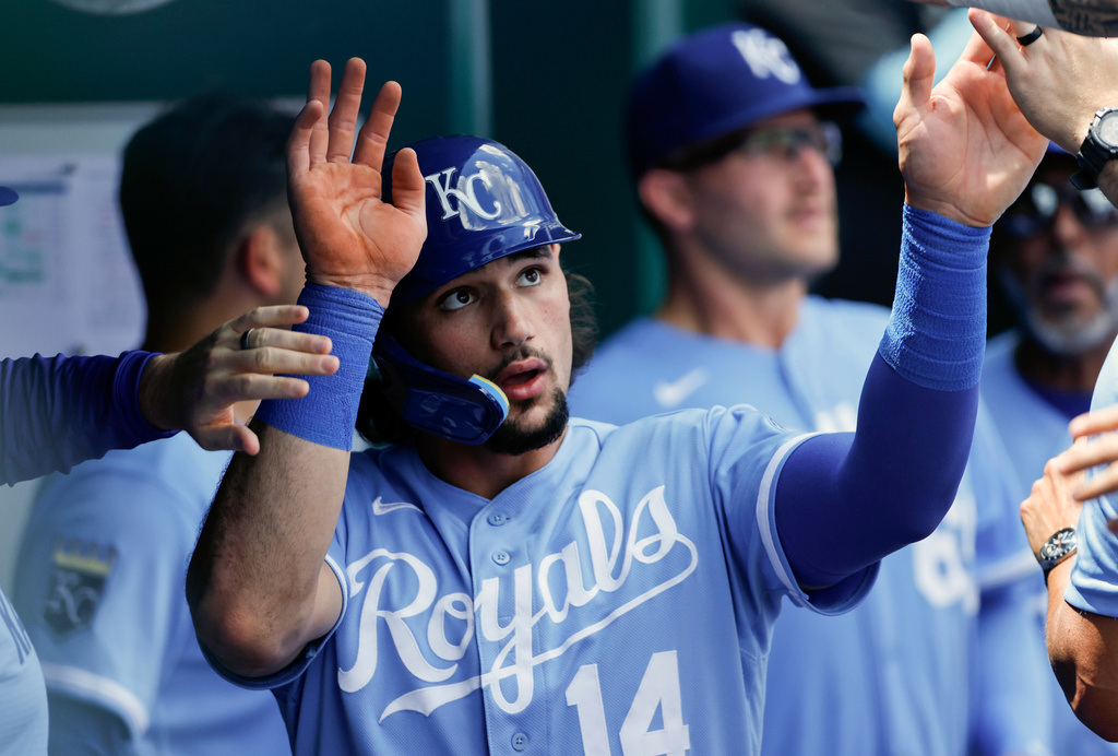 Kansas City Royals' Jac Caglianone celebrates in the dugout after scoring off a Nick Loftin double during the first inning of a baseball game against the Philadelphia Phillies in Kansas City, Mo., Monday, July 6, 2026. (AP Photo/Colin E. Braley)