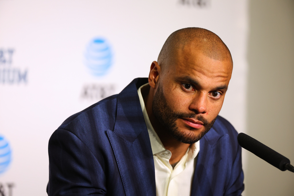 Dallas Cowboys' Dak Prescott takes a question during a news conference after an NFL football game against the Arizona Cardinals Monday, Nov. 3, 2025, in Arlington, Texas. (AP Photo/Richard Rodriguez)