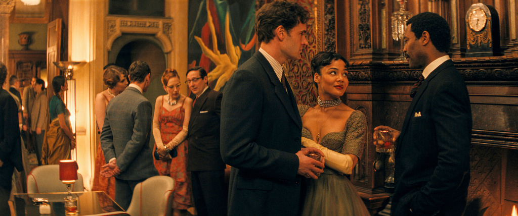 This image released by Prime shows Tom Bateman, foreground from left, Tessa Thompson, and Nicholas Pinnock in a scene from "Hedda." (Prime via AP)