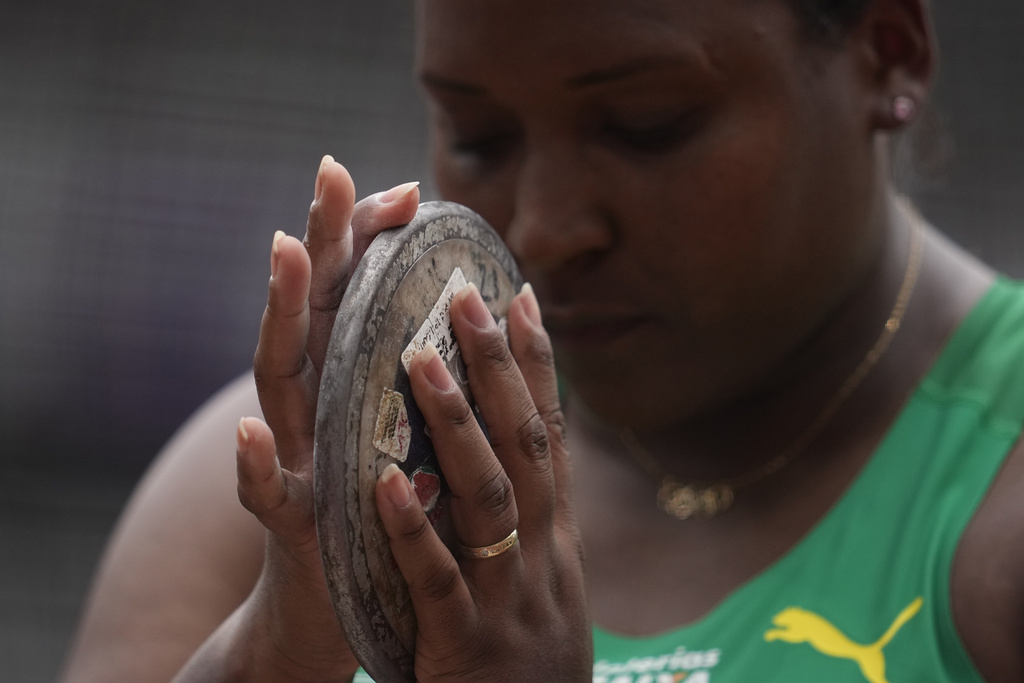 Brazil's Andressa De Morais holds a discus during the women's discus throw qualification at the World Athletics Championships in Tokyo, Saturday, Sept. 13, 2025. (AP Photo/Ashley Landis)