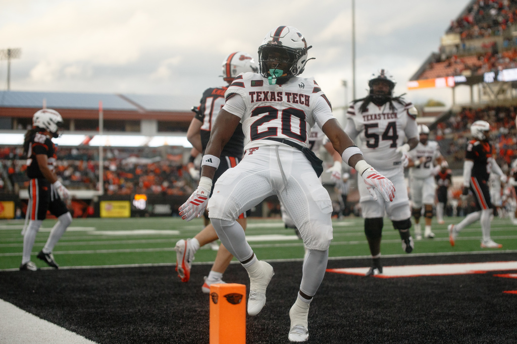 Texas Tech running back J'Koby Williams (20) celebrates a touchdown during the second half of an NCAA college football game against Oregon State, Saturday, Sept. 12, 2026, in Corvallis, Ore. (AP Photo/Lydia Ely)