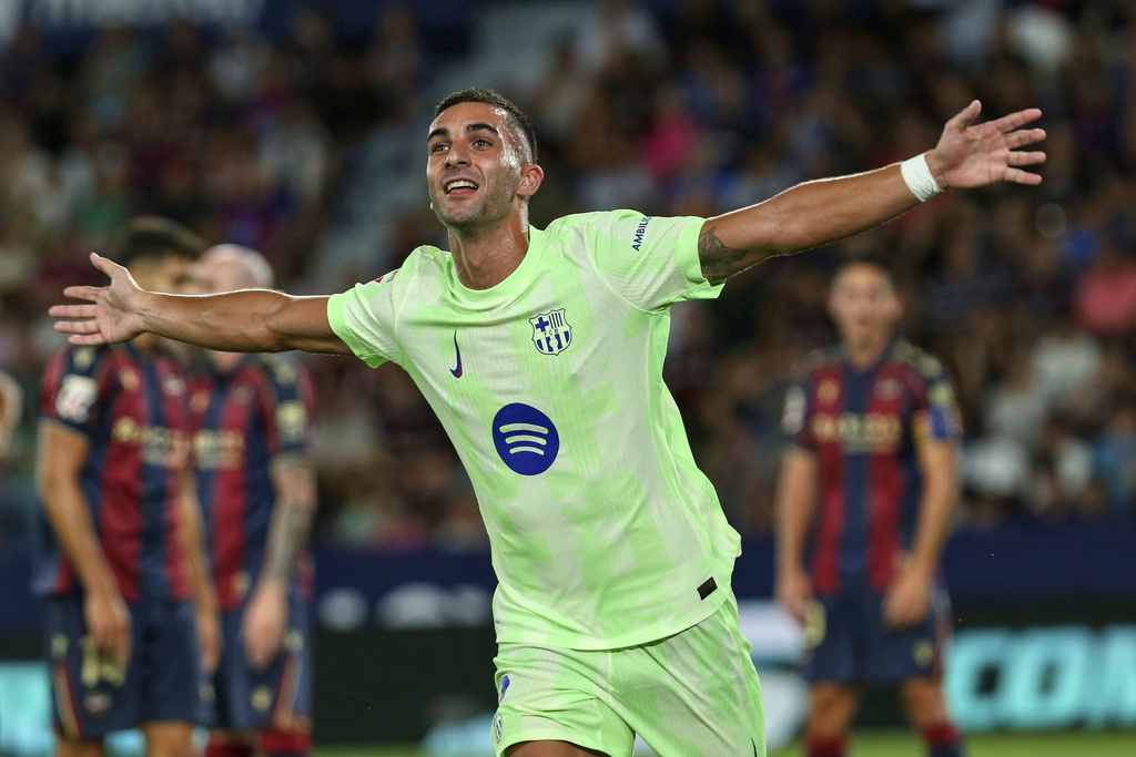 Barcelona's Ferran Torres reacts after scoring during the La Liga soccer match between Levante and Barcelon in Valencia, Spain, Saturday, Aug. 23, 2025. ((AP Photo/Alberto Saiz)