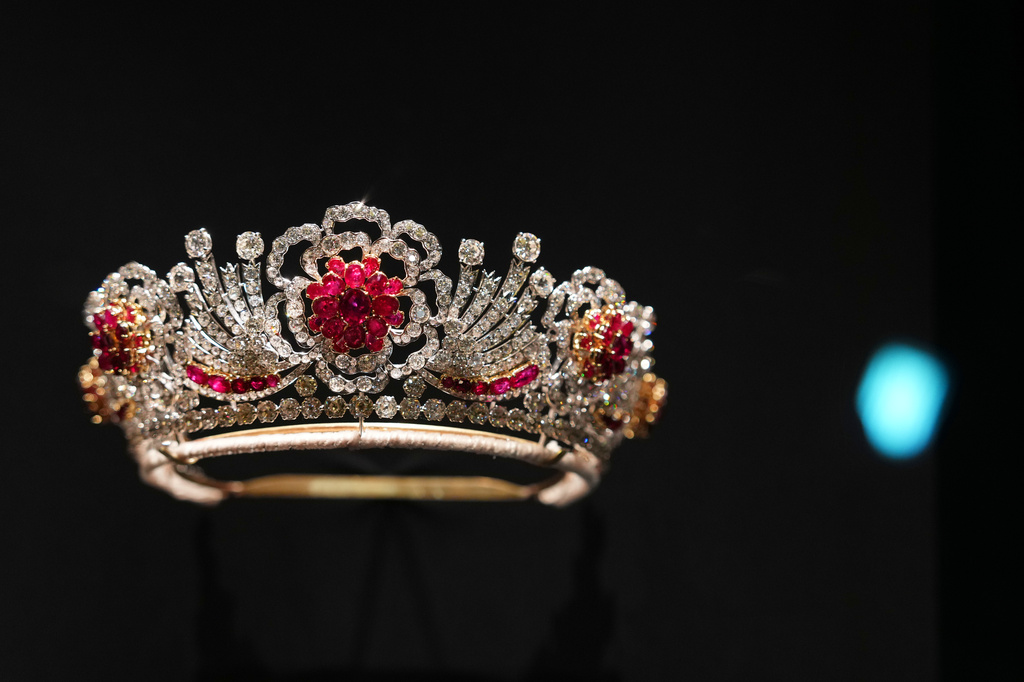 Queen Elizabeth II's Burmese Ruby Tiara on display at 'Queen Elizabeth II: Her Life in Style' exhibition, to mark the centenary of the late queen's birth, at The King's Gallery at Buckingham Palace in London, Thursday, April 9, 2026. (AP Photo/Kirsty Wigglesworth)